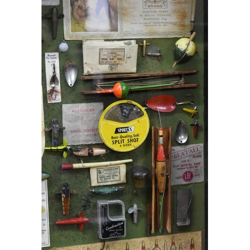 1468 - Angling: a framed display of fishing items, 63.5 x 79.5cm.