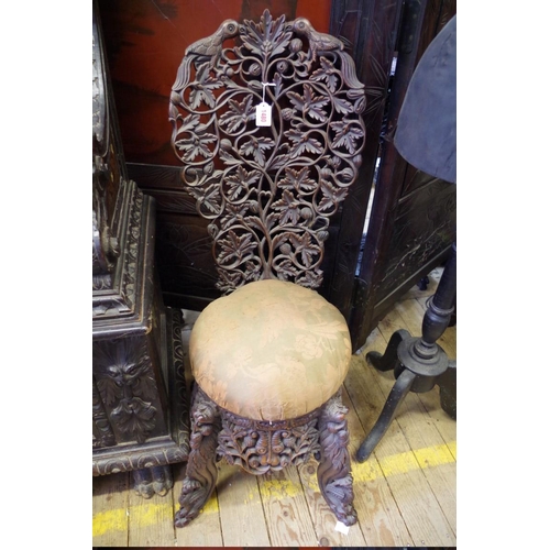 1480 - An 19th century Indian carved and pierced wood hall chair.