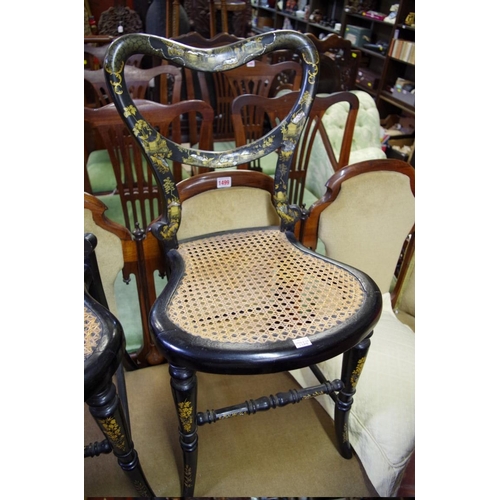 1498 - A pair of Victorian papier-mache and cane seat salon chairs.