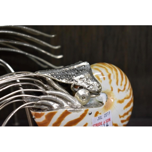 1514 - A graduated pair of novelty nautilus shell and white metal mounted sculptures, largest 25.5cm long.... 