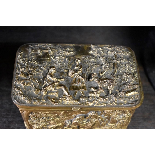 1522 - An antique Continental gilt metal casket, relief moulded with figures in a landscape, 13cm wide; tog... 