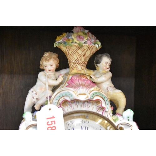 1585 - A late 19th century Dresden porcelain clock and stand, total height 33cm, (restoration), with p... 