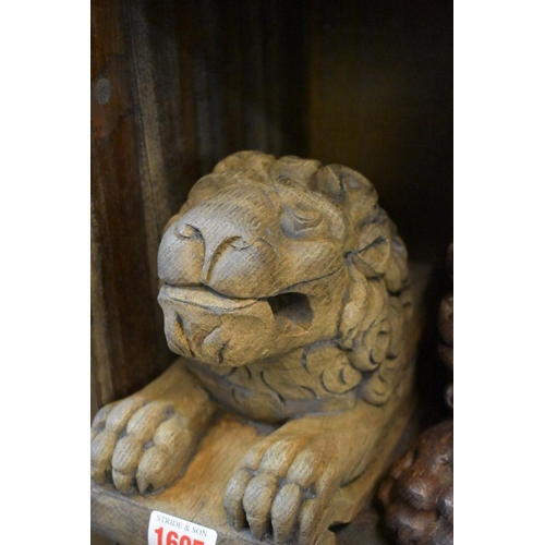 1605 - Two antique carved oak lion mask corbels, one possibly 17th century.