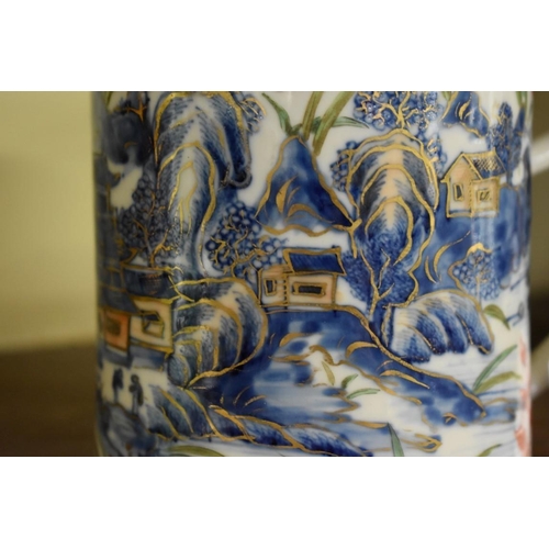 1626 - A Chinese 'clobbered' blue and white mug, late 18th century, 13cm high.