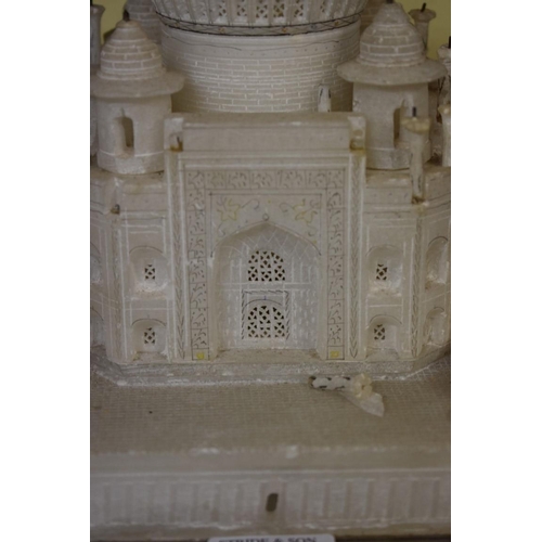 1669 - An Indian alabaster temple, 21cm high. 