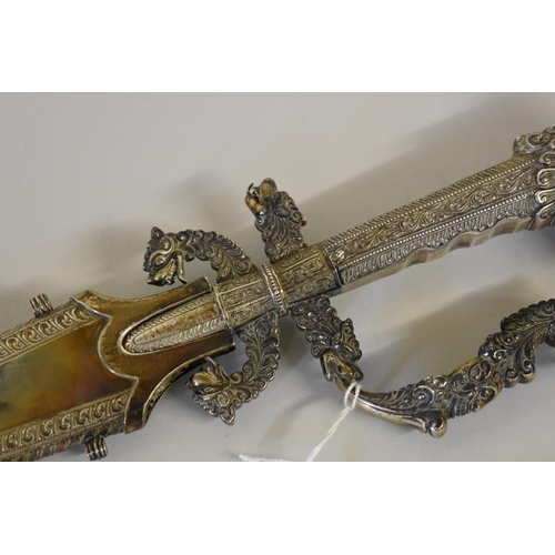 1681 - An ornamental white metal and plated Singalese Sri Lanka kastane, and scabbard, 62cm.... 