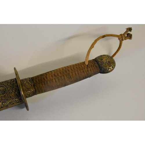 1684 - A Chinese Dao sword, having shagreen scabbard and brass mounts, 71cm.