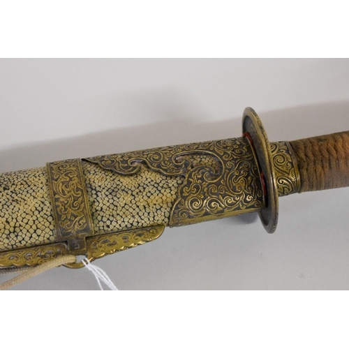 1684 - A Chinese Dao sword, having shagreen scabbard and brass mounts, 71cm.