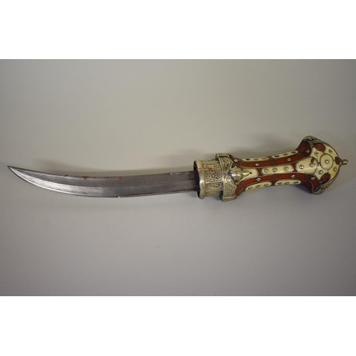 1695 - An Arab jambiya dagger, having 21cm blade, in sheath.