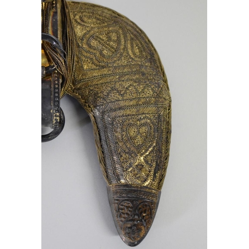 1698 - An Arab jambiya and sheath, inscribed 'National Drilling Company', 14cm blade.