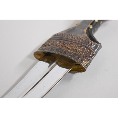 1698 - An Arab jambiya and sheath, inscribed 'National Drilling Company', 14cm blade.