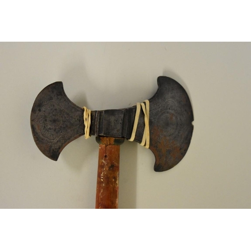 1704 - An Indo Persian battle axe, having painted wood handle, first half 19th century, 52.5cm.... 