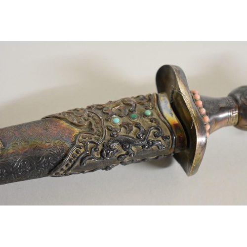 1715 - A Chinese dagger, having 20cm blade, with ornate gem set handle and sheath.