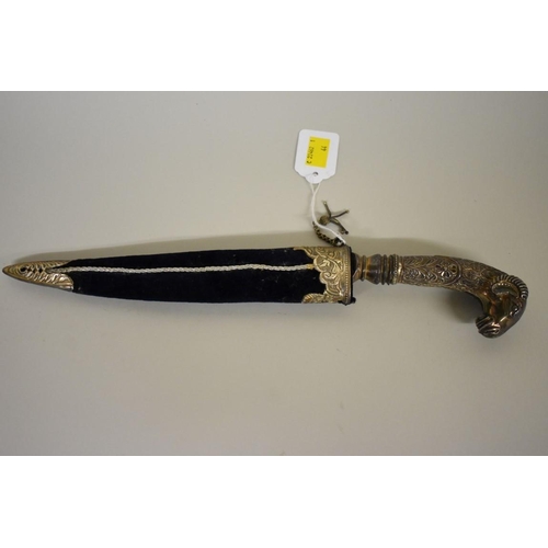 1719 - An Indo-Persian dagger, having 18.5cm Damascus blade, white metal rams head handle and velvet s... 