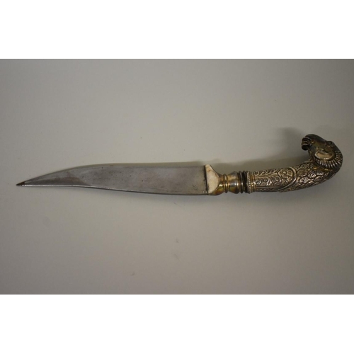 1719 - An Indo-Persian dagger, having 18.5cm Damascus blade, white metal rams head handle and velvet s... 