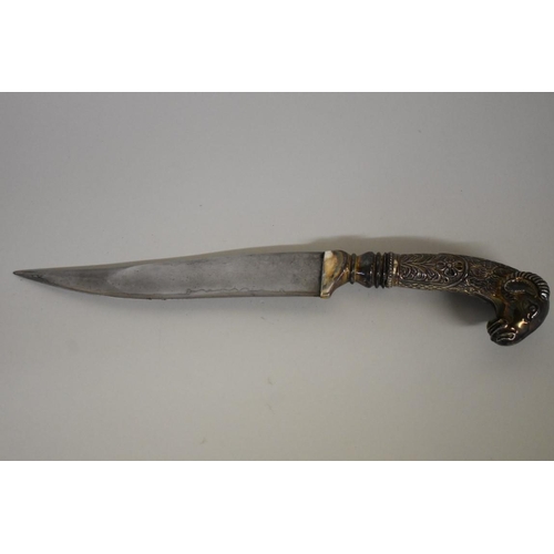 1719 - An Indo-Persian dagger, having 18.5cm Damascus blade, white metal rams head handle and velvet s... 