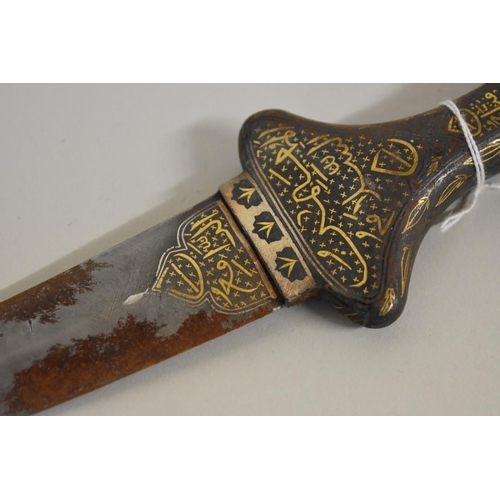 1721 - An Indo-Persian jambiya, having 18cm Damascus blade, with sheath, the whole decorated with gilt scri... 