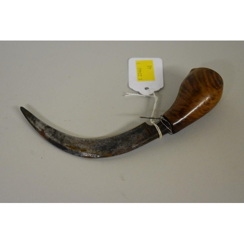 1723 - An Eastern karambit type knife and sheath.