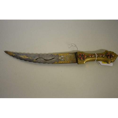 1724 - An Arab jambiya, having pierced 24cm blade, with sheath.