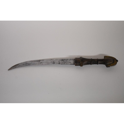 1727 - An Arab jambiya, having 23.5cm blade, with sheath.