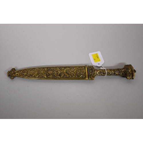 1729 - A rare Spanish Albacete dagger, having pierced 16.5cm blade, with ornate gilt metal handle and scabb... 