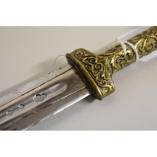 1729 - A rare Spanish Albacete dagger, having pierced 16.5cm blade, with ornate gilt metal handle and scabb... 