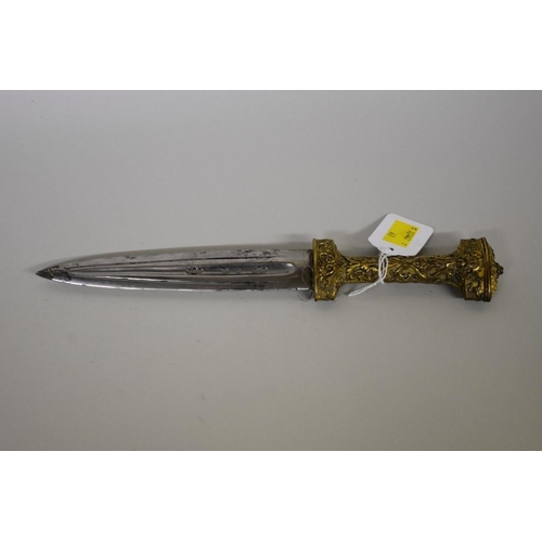 1729 - A rare Spanish Albacete dagger, having pierced 16.5cm blade, with ornate gilt metal handle and scabb... 