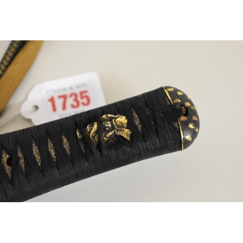 1735 - A Japanese Wakizashi sword, having 30cm fullered blade, signed to tang, with black and gilt lacquere... 