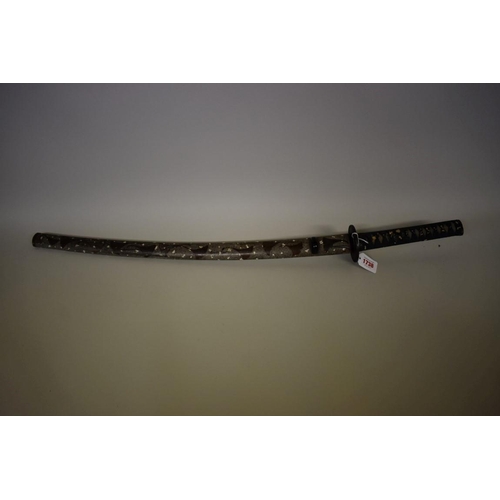 1738 - A Japanese Wakizashi sword, having 54cm blade, signed tang, in lacquer scabbard.