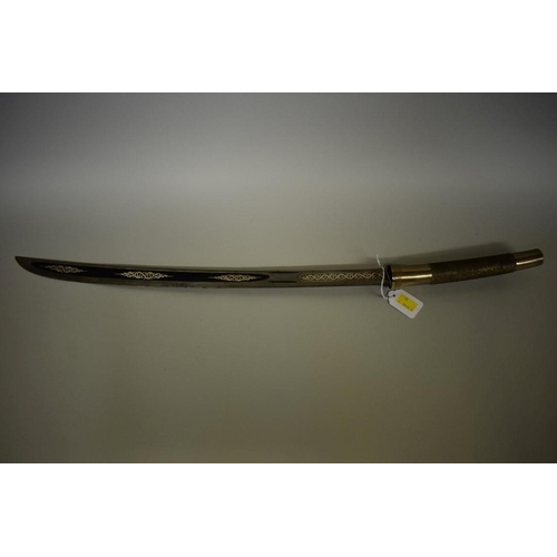 1739 - A Burmese dha, having decorative silver inlaid blade in wood scabbard, 55cm blade.... 