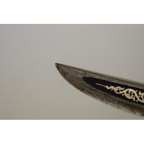 1739 - A Burmese dha, having decorative silver inlaid blade in wood scabbard, 55cm blade.... 