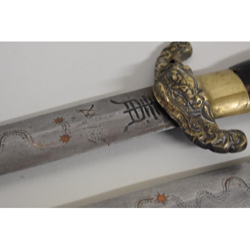 1740 - A pair of Chinese butterfly swords, having 53cm blades with brass mounted shagreen scabbard.... 