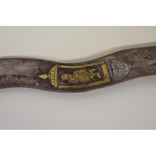 1741 - A North Indian or Nepalese Naga wavy edge blade sword, having 73cm blade, no scabbard.... 