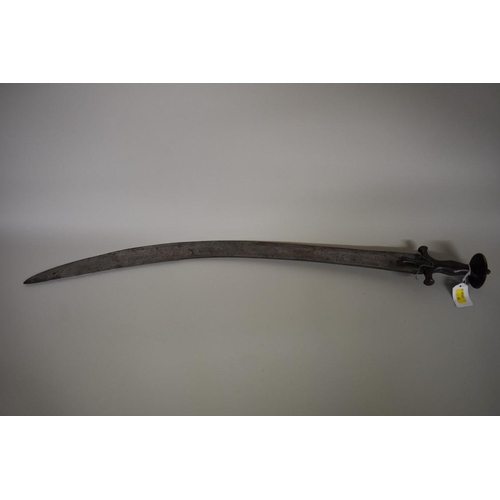 1742 - An antique Indo-Persian Tulwar sword, having 68cm blade, in later scabbard.