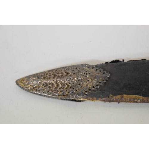 1748 - A Nepalese Sirupate khukuri, having ornate white metal handle and white metal mounts to scabbar... 