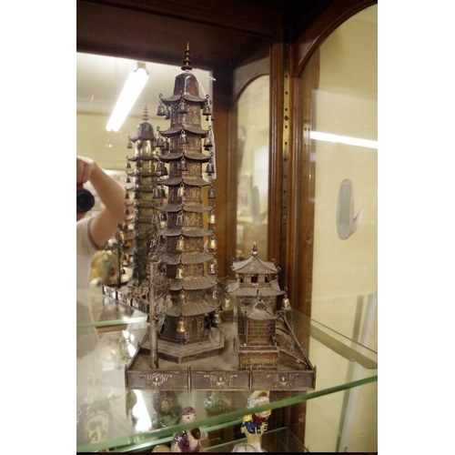 1767 - A Chinese metal pagoda temple, 34cm high.