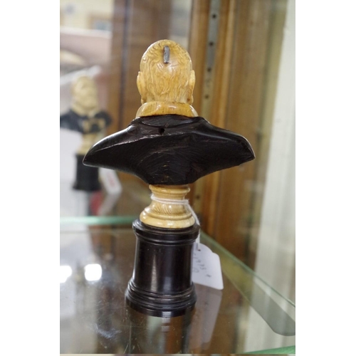 1791 - A late 17th century European ivory and ebony bust, possibly a reliquary, total height 16cm.... 