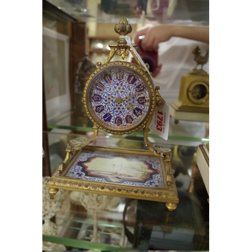 1793 - A brass and porcelain mounted timepiece, probably for the Turkish market, 18cm high.... 