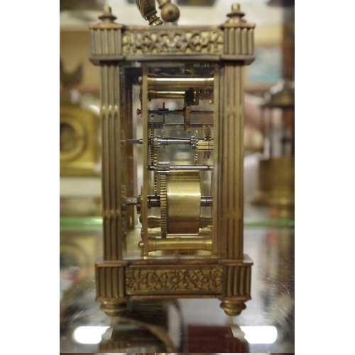 1795 - An old brass carriage timepiece, height including handle 15.5cm.