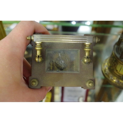 1795 - An old brass carriage timepiece, height including handle 15.5cm.