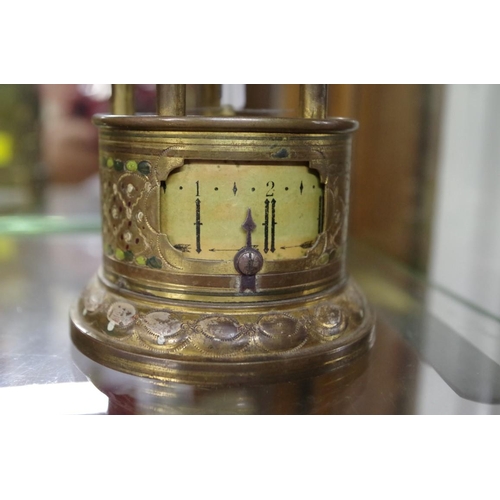 1796 - A Eugene Farcot brass novelty mystery clock, 18cm high.