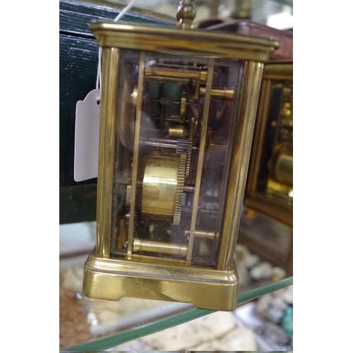 1798 - An old brass carriage clock, with bell striking alarm, height including handle 16.5cm, with ori... 