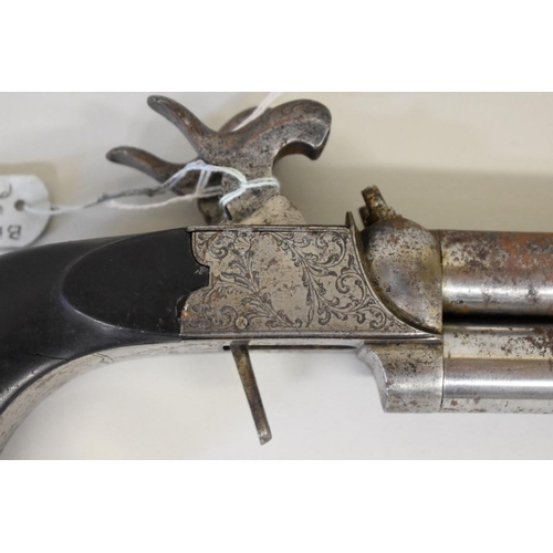 1868 - A 19th century Belgian double barrel over and under percussion pistol, with side by side mounted twi... 