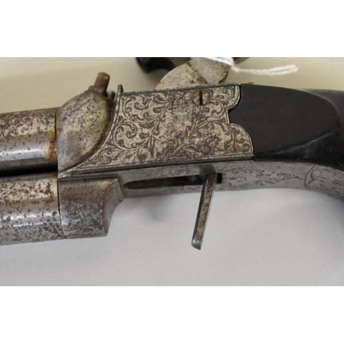 1868 - A 19th century Belgian double barrel over and under percussion pistol, with side by side mounted twi... 