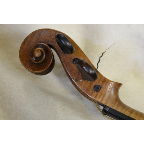 1869 - A late 19th century Continental violin, with 14in two piece back, bearing label inscribed 'Gio Paulo... 