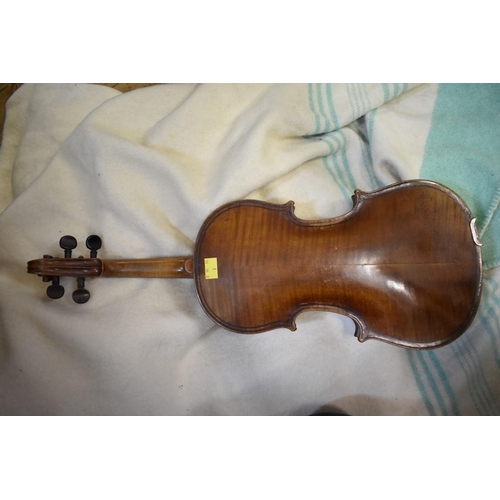 1869 - A late 19th century Continental violin, with 14in two piece back, bearing label inscribed 'Gio Paulo... 