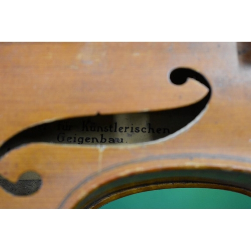 1870 - An antique German violin, with 14in two piece back, inscribed on label 'Alban Voigt & Co...', in... 