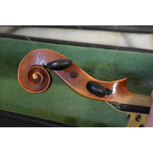 1876 - An antique Continental violin, with 14in two piece back, with two bows and case; together with anoth... 