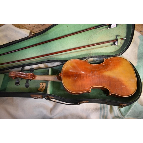 1876 - An antique Continental violin, with 14in two piece back, with two bows and case; together with anoth... 