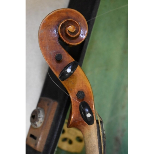 1876 - An antique Continental violin, with 14in two piece back, with two bows and case; together with anoth... 